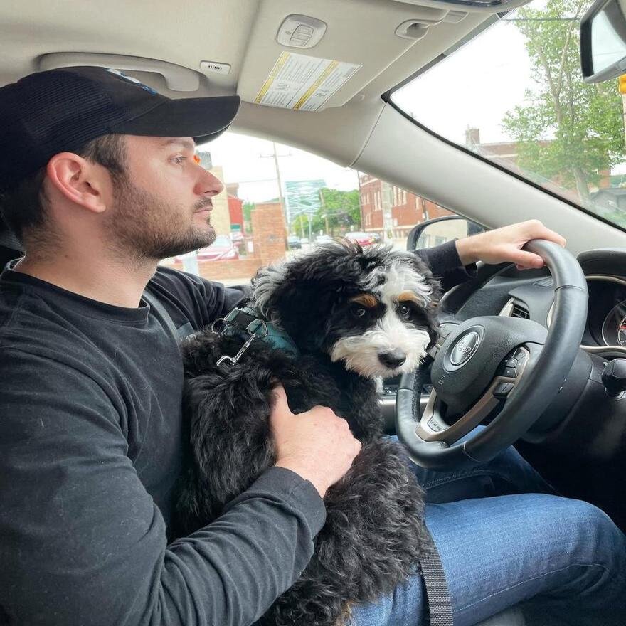 Happy family with puppy