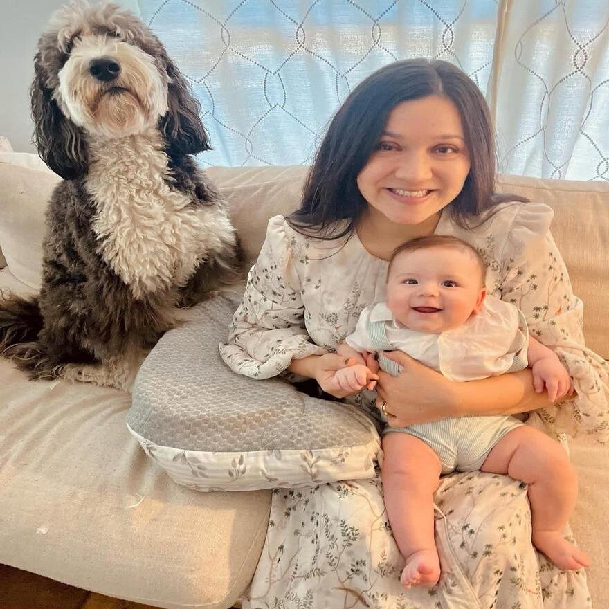 Happy family with puppy